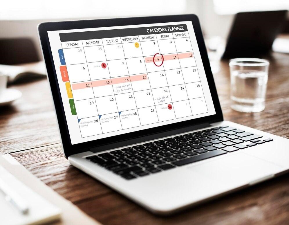 A project management and timeline organization plan displayed on a laptop screen, representing the importance of stress-free home expansion planning.